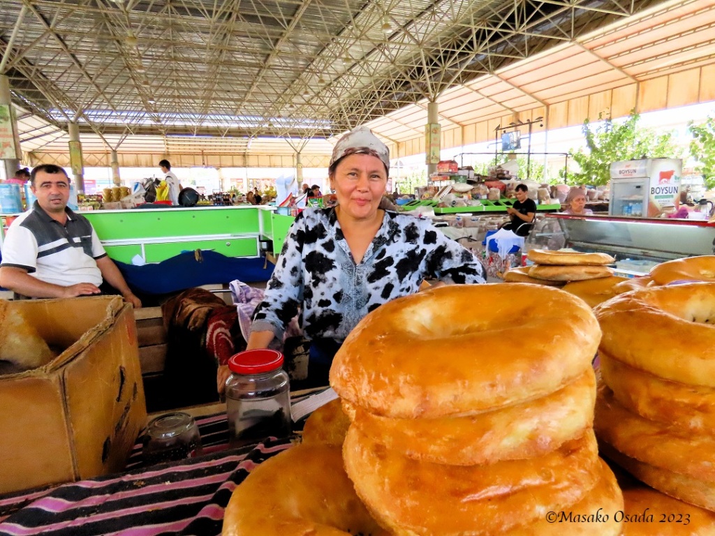 Bread sellers, market, on the way from Karatepa to Kirk Kiz fortress, Uzbekistan